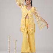 Pastel yellow Co ord set with Bell Bottom Pants and cut detailling in the Front