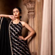 Halter neck Slit Black Kurta in Leheriya Banarasi Fabric with Flared Kali Pallazo and Dupatta set