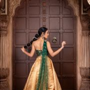 Tube Banarasi Emerald green blouse with Drape net Dupatta and Golden banarasi Skirt Set