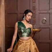 Tube Banarasi Emerald green blouse with Drape net Dupatta and Golden banarasi Skirt Set