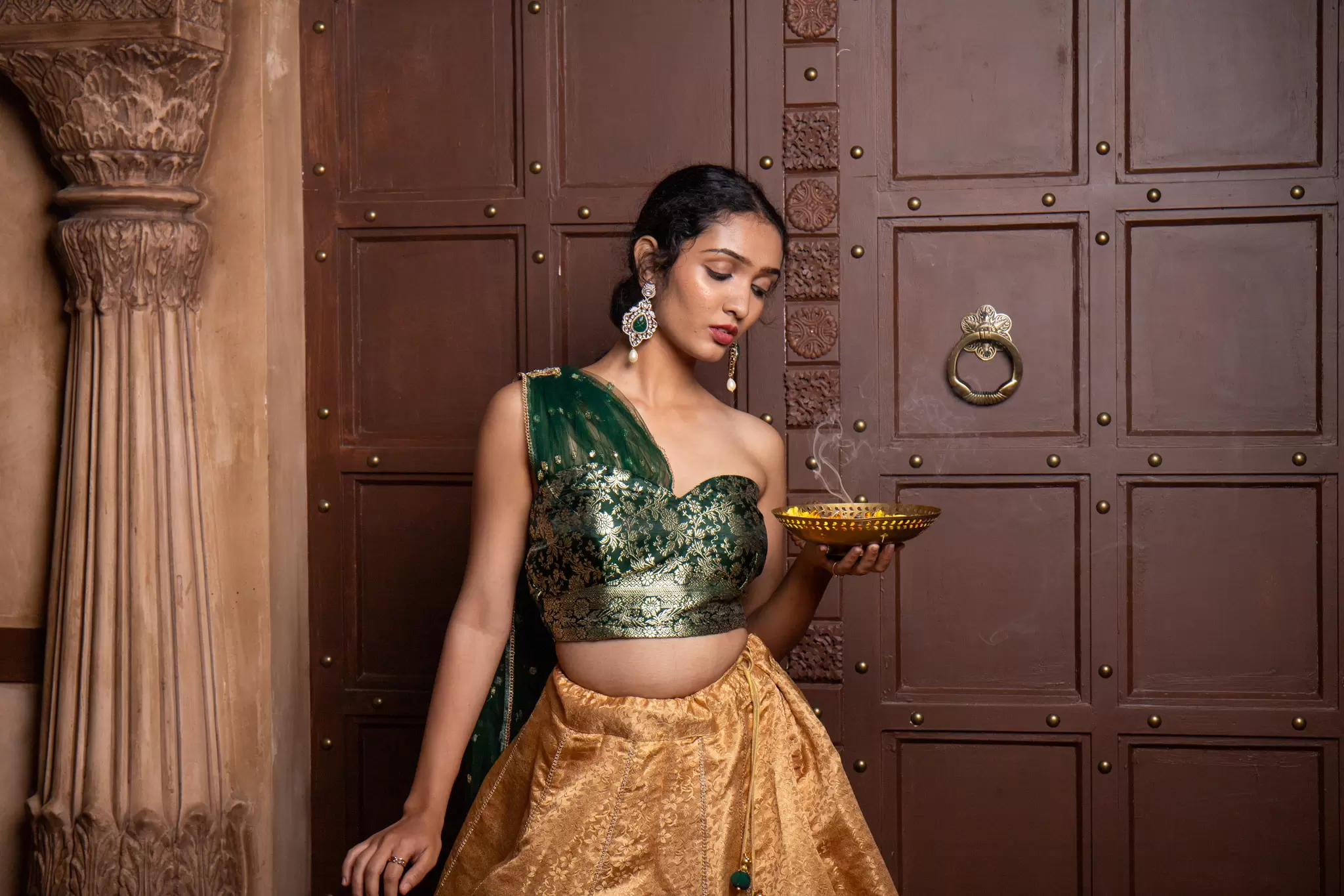 Tube Banarasi Emerald green blouse with Drape net Dupatta and Golden banarasi Skirt Set