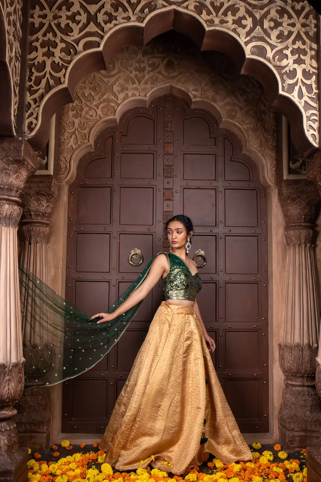 Tube Banarasi Emerald green blouse with Drape net Dupatta and Golden banarasi Skirt Set