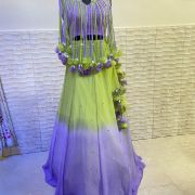 Neon green to lavender shaded lehenga with tassels blouse