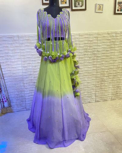 Neon green to lavender shaded lehenga with tassels blouse