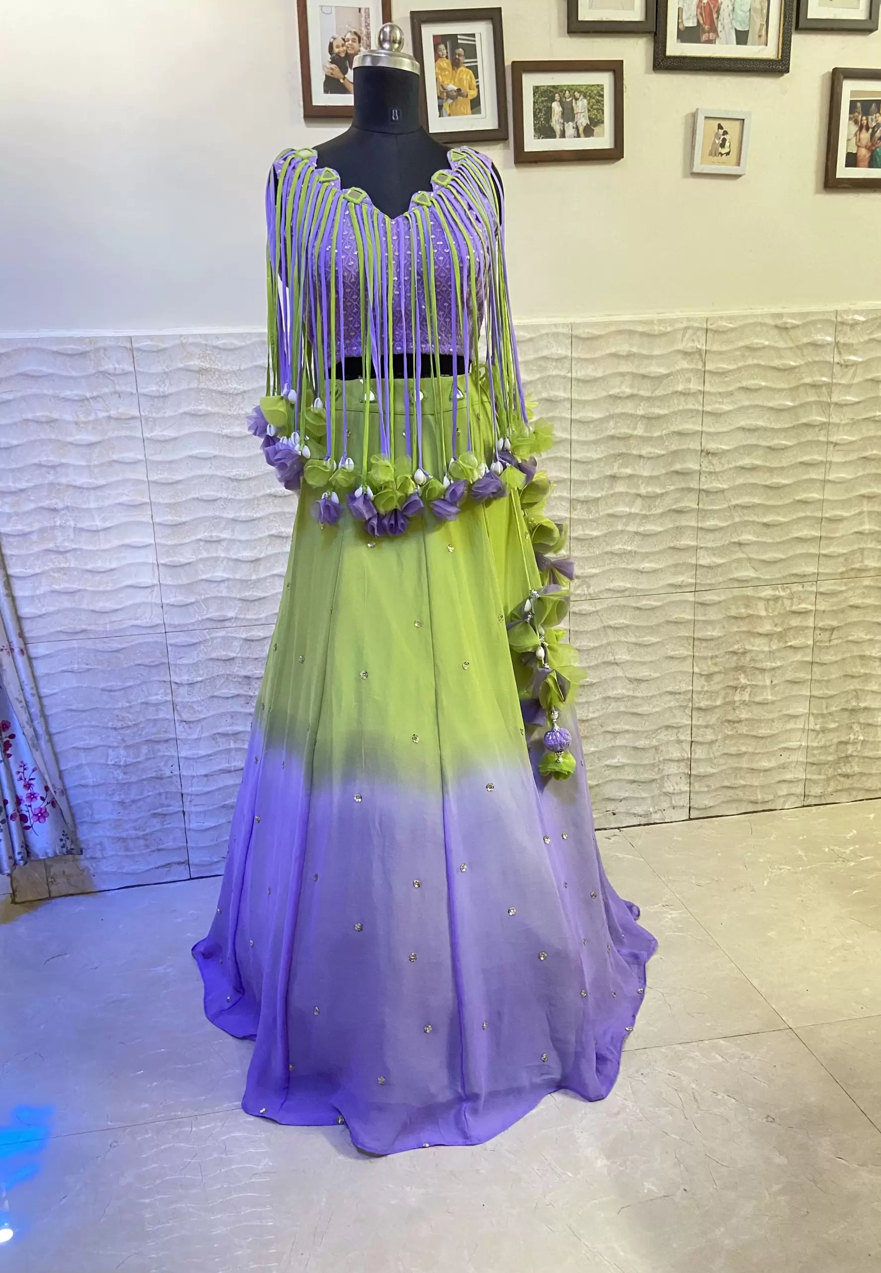Neon green to lavender shaded lehenga with tassels blouse
