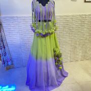 Neon green to lavender shaded lehenga with tassels blouse