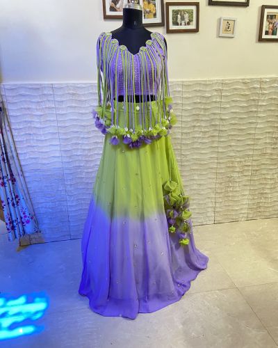 Neon green to lavender shaded lehenga with tassels blouse