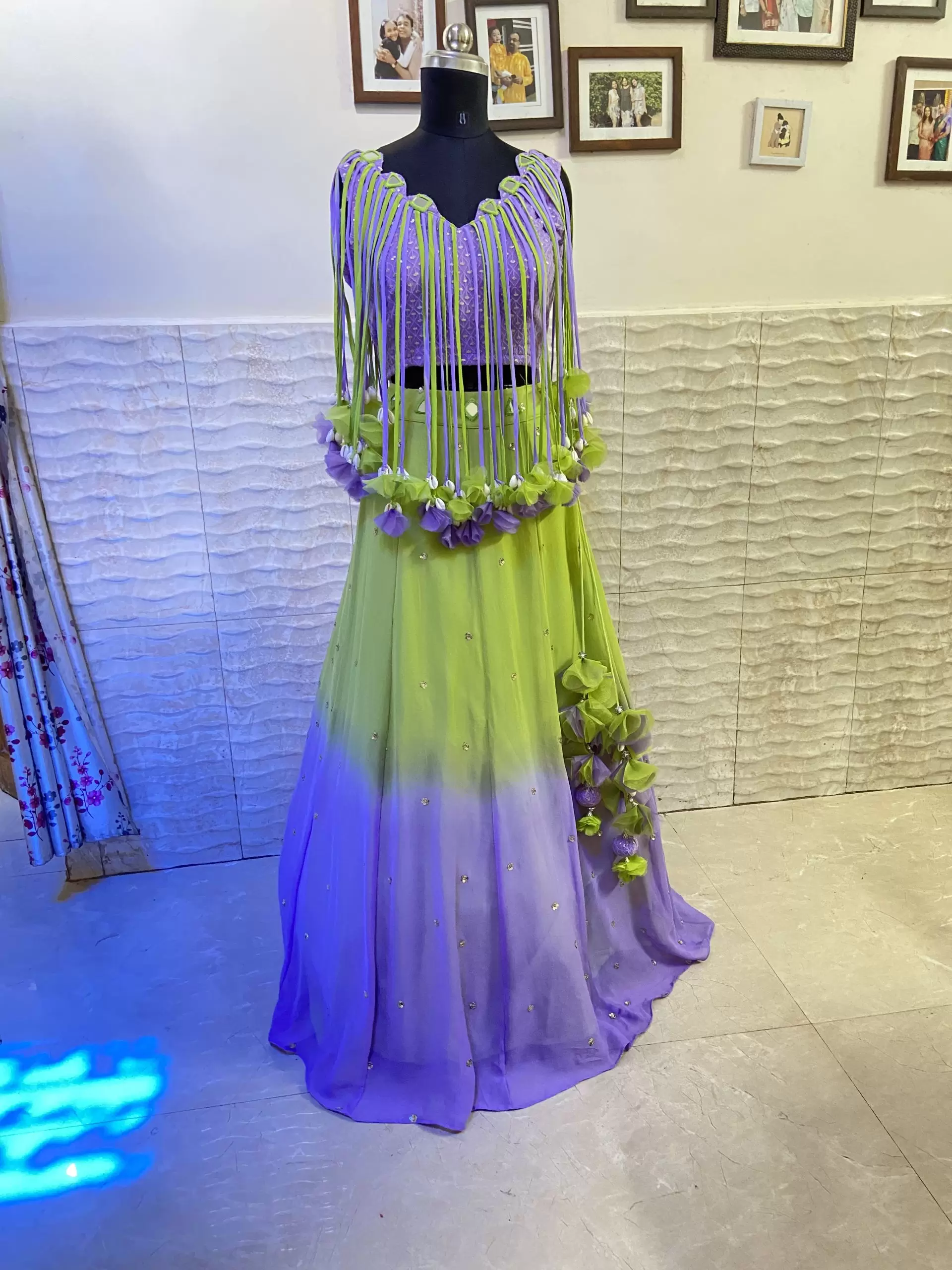 Neon green to lavender shaded lehenga with tassels blouse