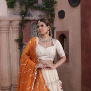 Ivory Maharani Lehenga with zari embroidery & Rust Orange Dupatta