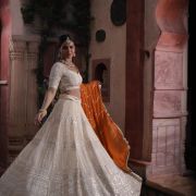 Ivory Maharani Lehenga with zari embroidery & Rust Orange Dupatta