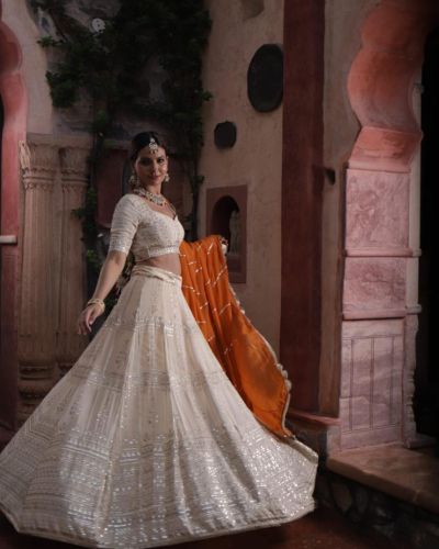 Ivory Maharani Lehenga with zari embroidery & Rust Orange Dupatta