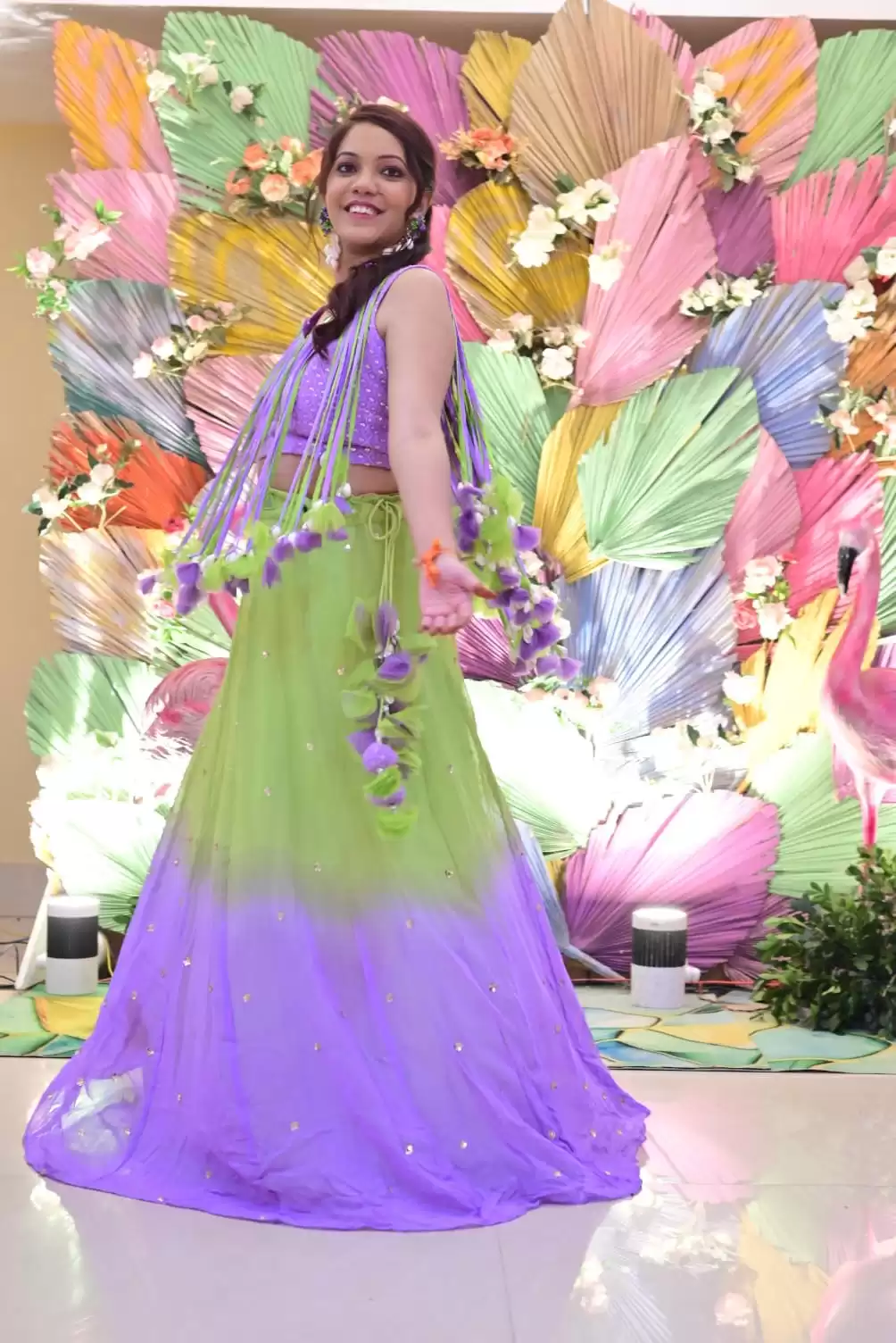 Neon green to lavender shaded lehenga with tassels blouse