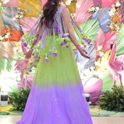 Neon green to lavender shaded lehenga with tassels blouse