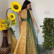 Tube Banarasi Emerald green blouse with Drape net Dupatta and Golden banarasi Skirt Set