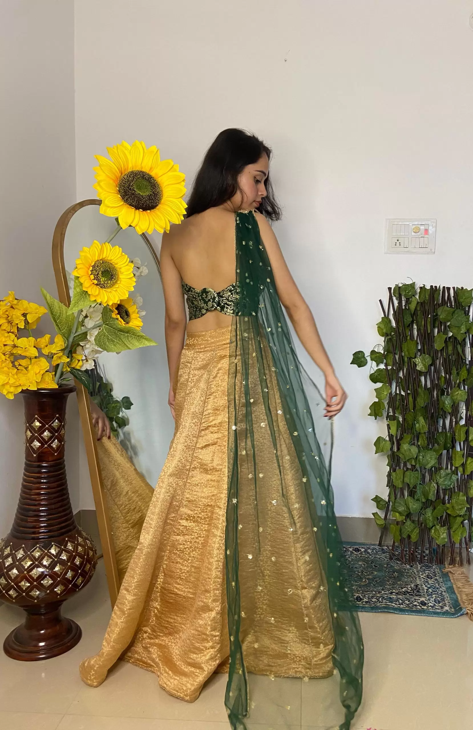 Tube Banarasi Emerald green blouse with Drape net Dupatta and Golden banarasi Skirt Set