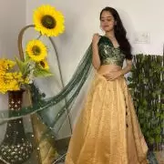 Tube Banarasi Emerald green blouse with Drape net Dupatta and Golden banarasi Skirt Set