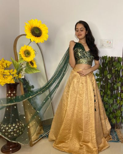 Tube Banarasi Emerald green blouse with Drape net Dupatta and Golden banarasi Skirt Set