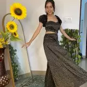 Black Banarasi Off shoulder Jumpsuit with Cut detail on the waist and puffed sleeves