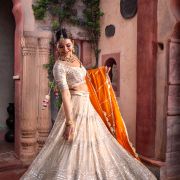 Ivory Maharani Lehenga with zari embroidery & Rust Orange Dupatta