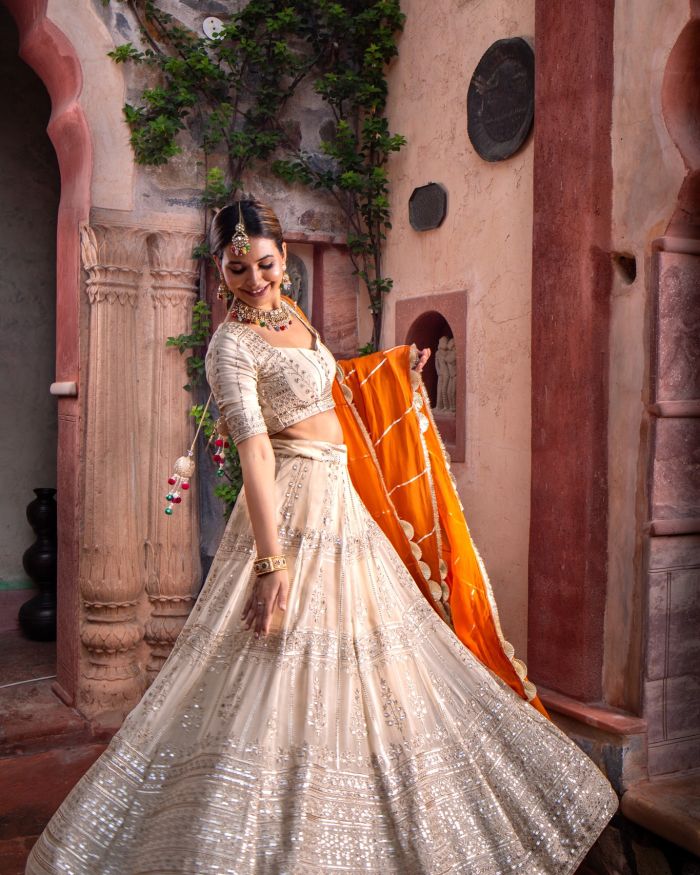 Ivory Maharani Lehenga with zari embroidery & Rust Orange Dupatta