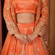 Rust orange pure cosmos tissue silk lehenga with heavy Embroidered jacket