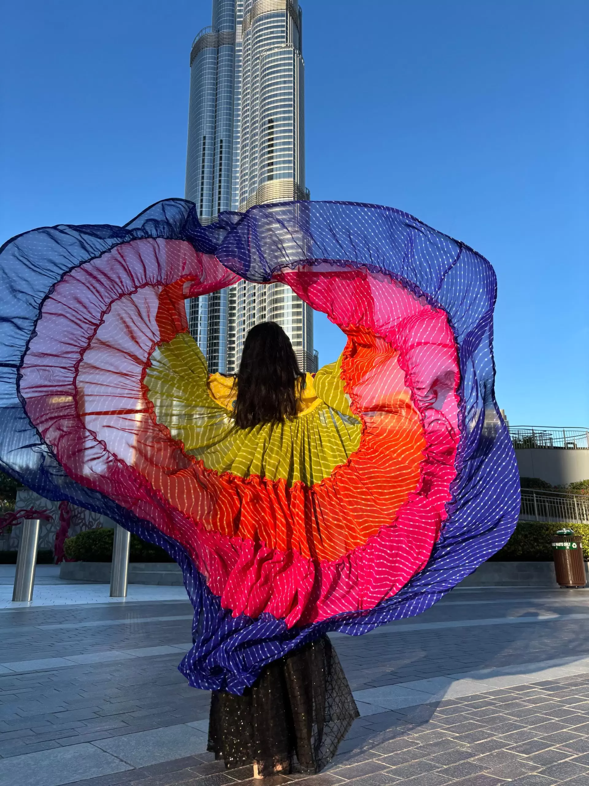 Leheriya multi coloured full flare shrug with mirror work detailing