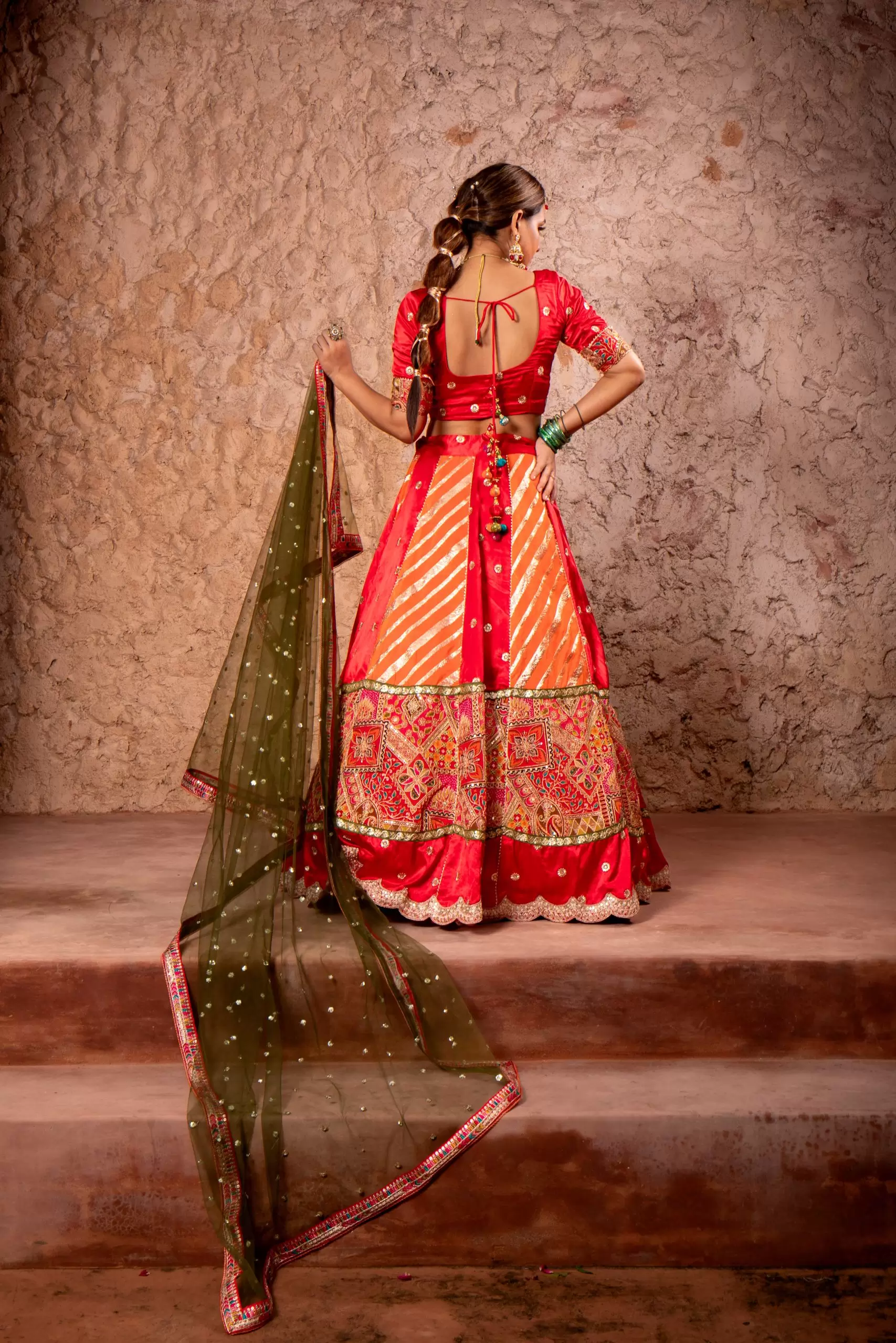Orange & Red Kalidar Lehenga set with mehendi Green Dupatta
