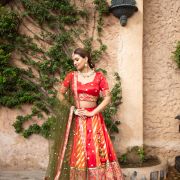 Orange & Red Kalidar Lehenga set with mehendi Green Dupatta