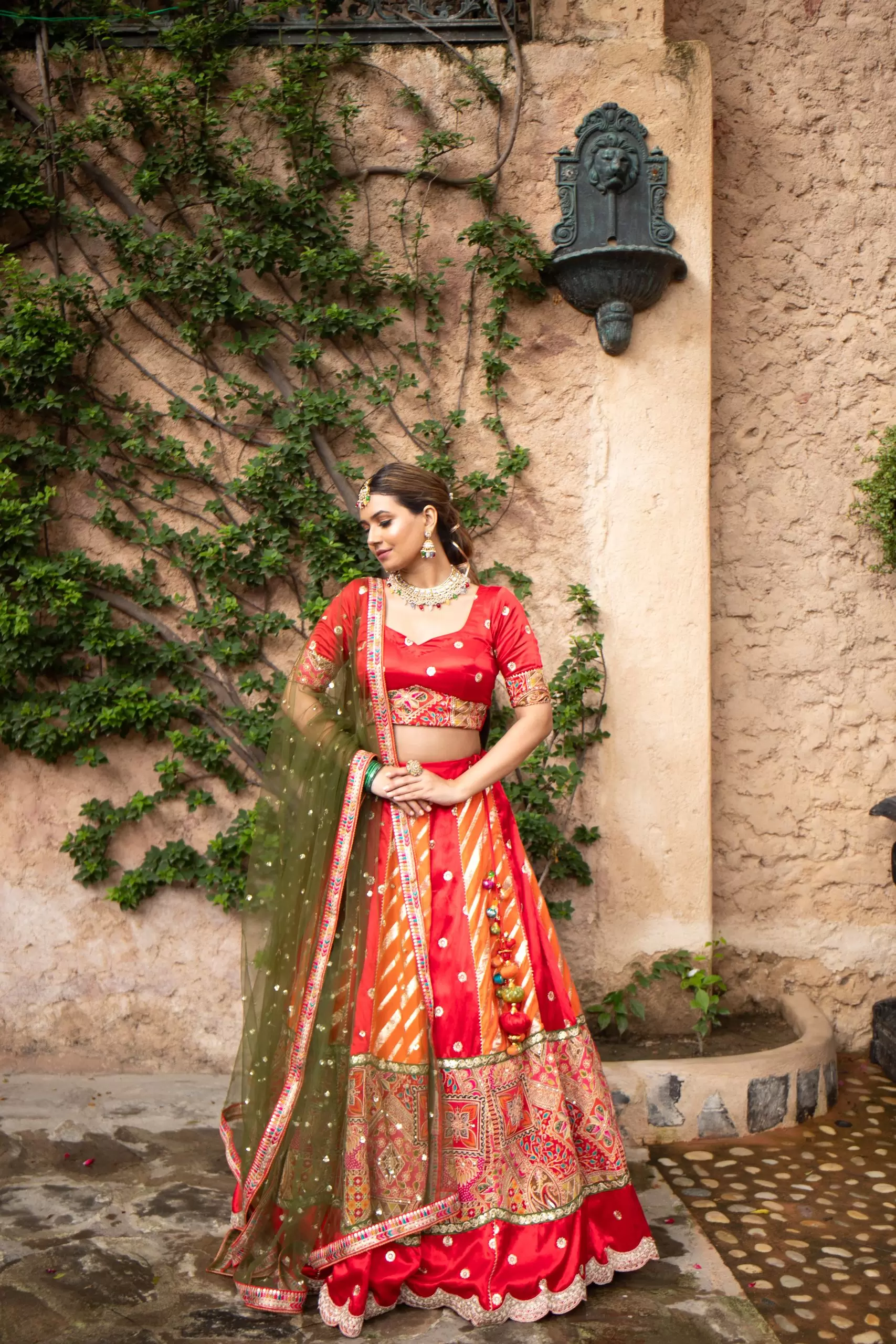 Orange & Red Kalidar Lehenga set with mehendi Green Dupatta