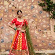 Orange & Red Kalidar Lehenga set with mehendi Green Dupatta