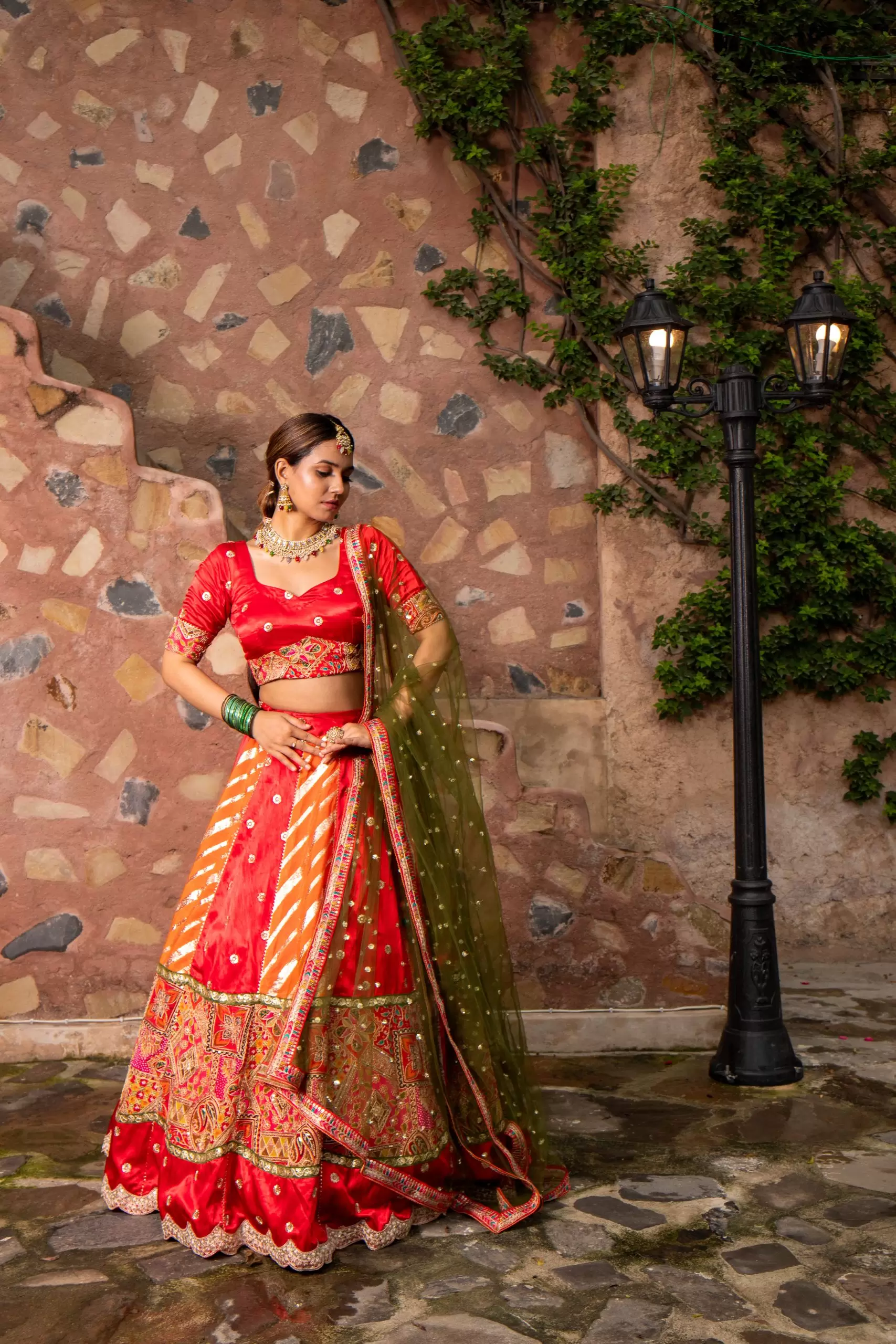 Orange & Red Kalidar Lehenga set with mehendi Green Dupatta