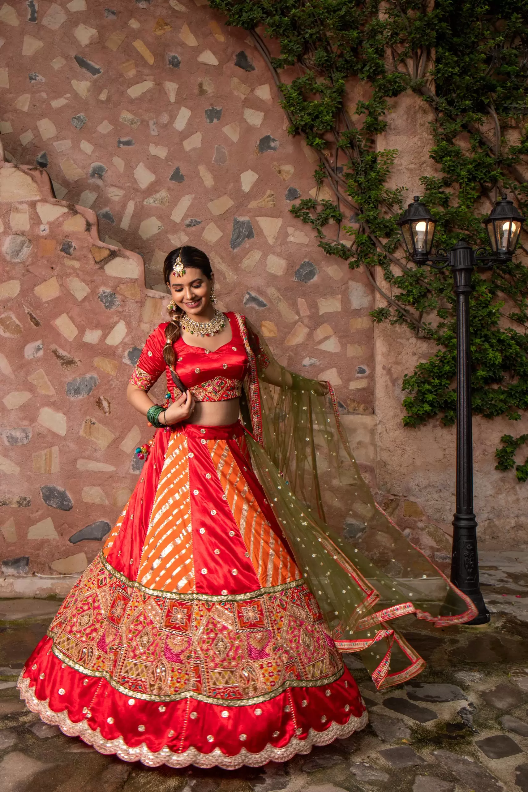 Orange & Red Kalidar Lehenga set with mehendi Green Dupatta