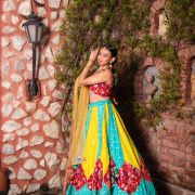 Ferozi blue and Yellow with Rani pink patch detailling Gherdaar lehenga