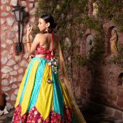 Ferozi blue and Yellow with Rani pink patch detailling Gherdaar lehenga