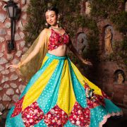 Ferozi blue and Yellow with Rani pink patch detailling Gherdaar lehenga