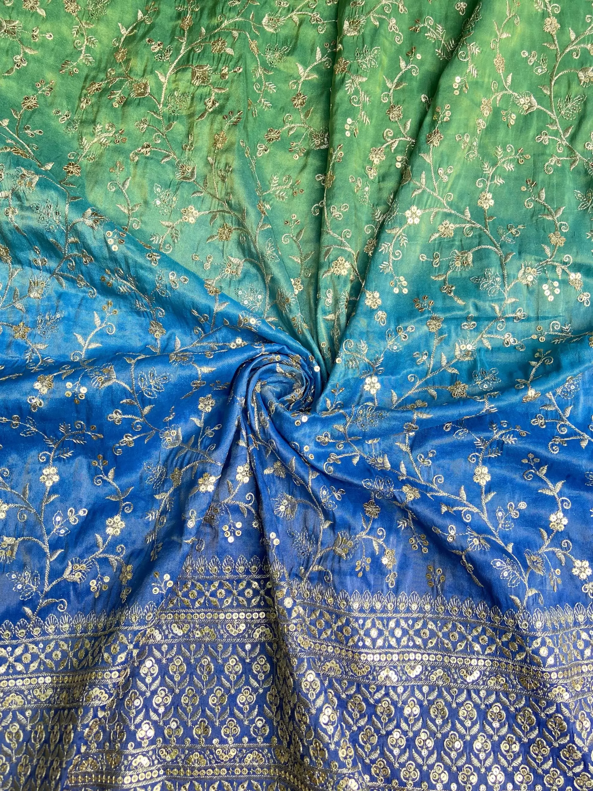 Green to blue Ombre Shaded tissue silk fabric with heavy floral Zari and sequin embroidery with border