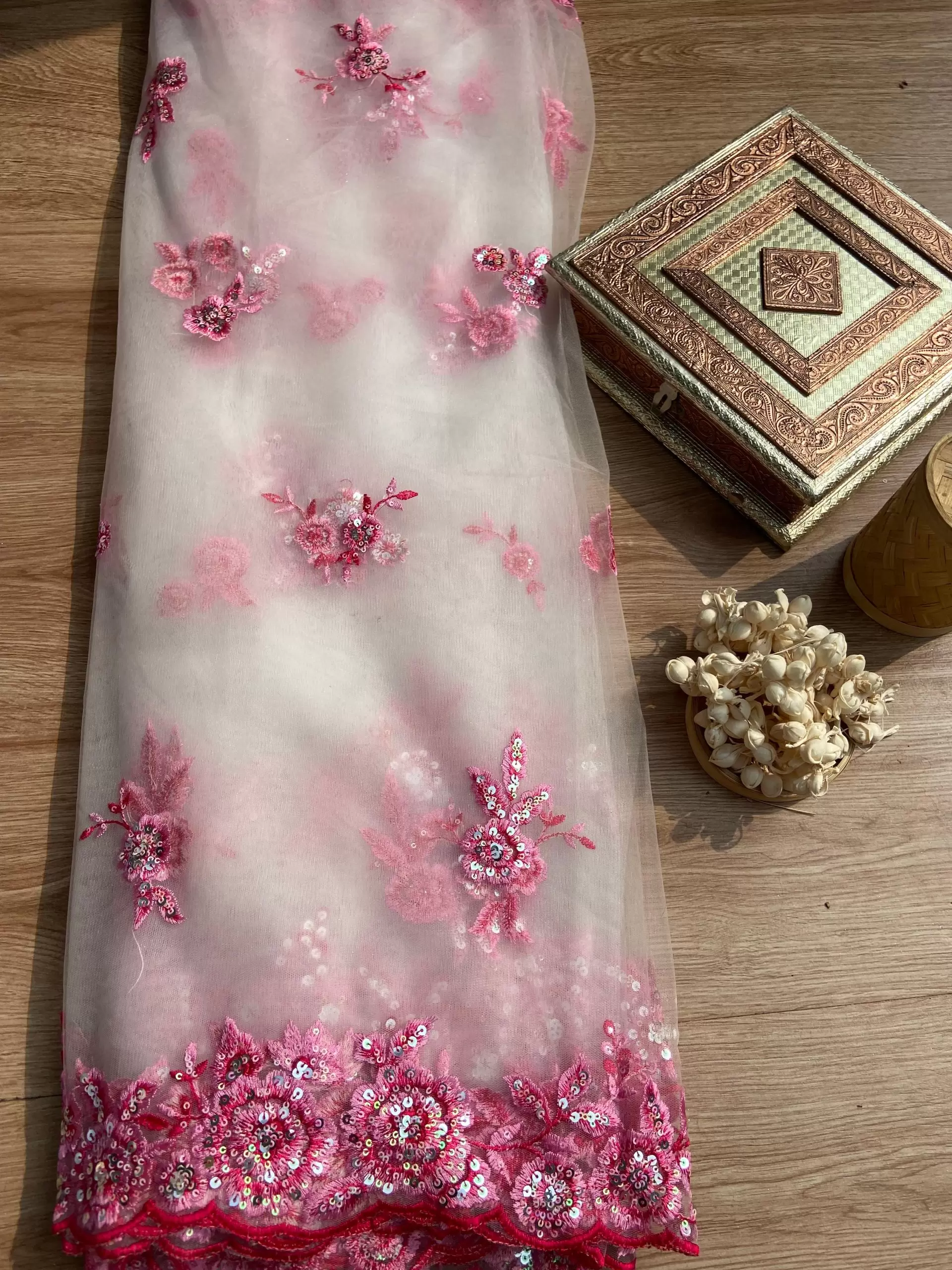 Pink thread and sequin floral embroidery border on net fabric dupatta