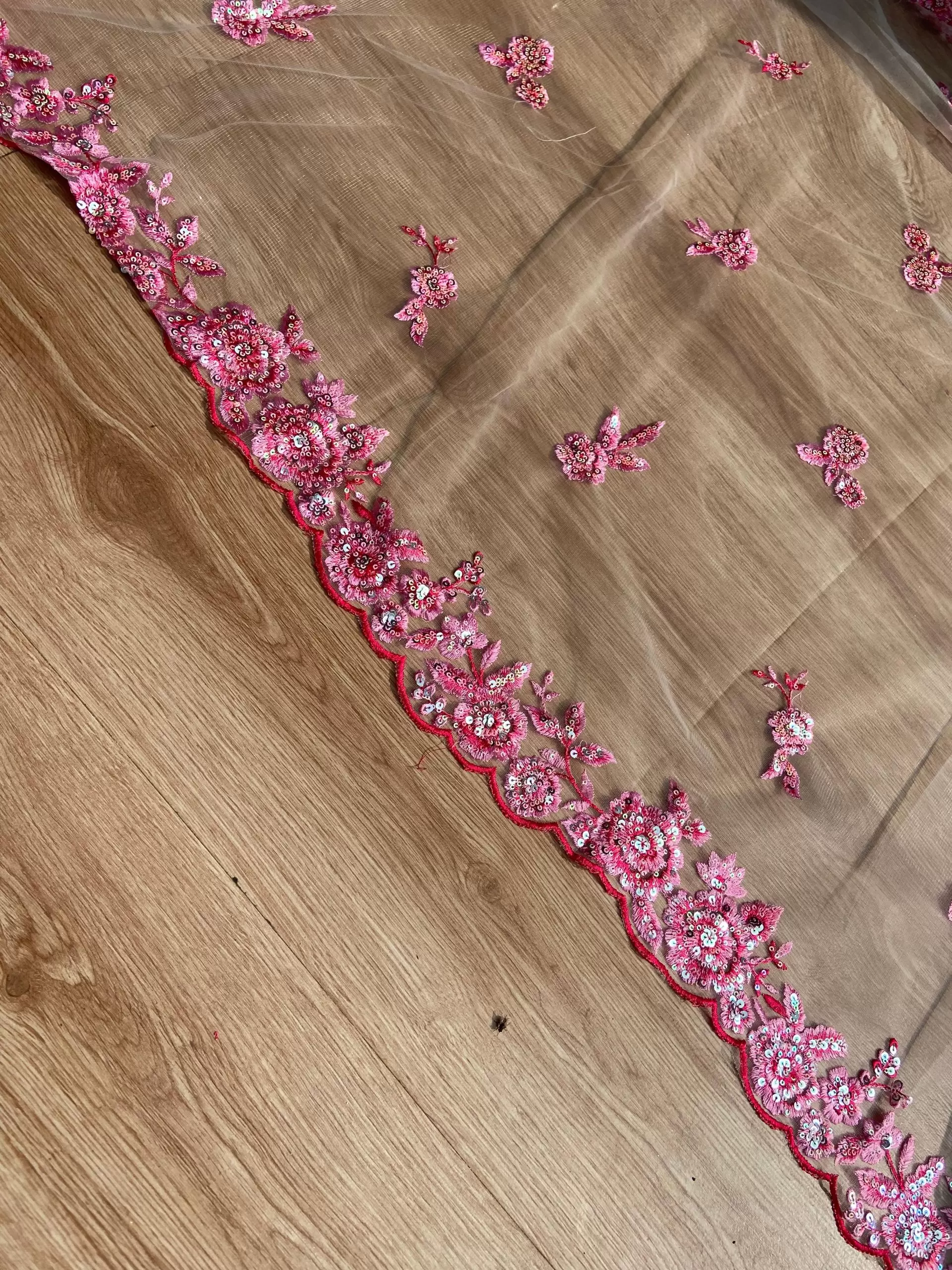 Pink thread and sequin floral embroidery border on net fabric dupatta
