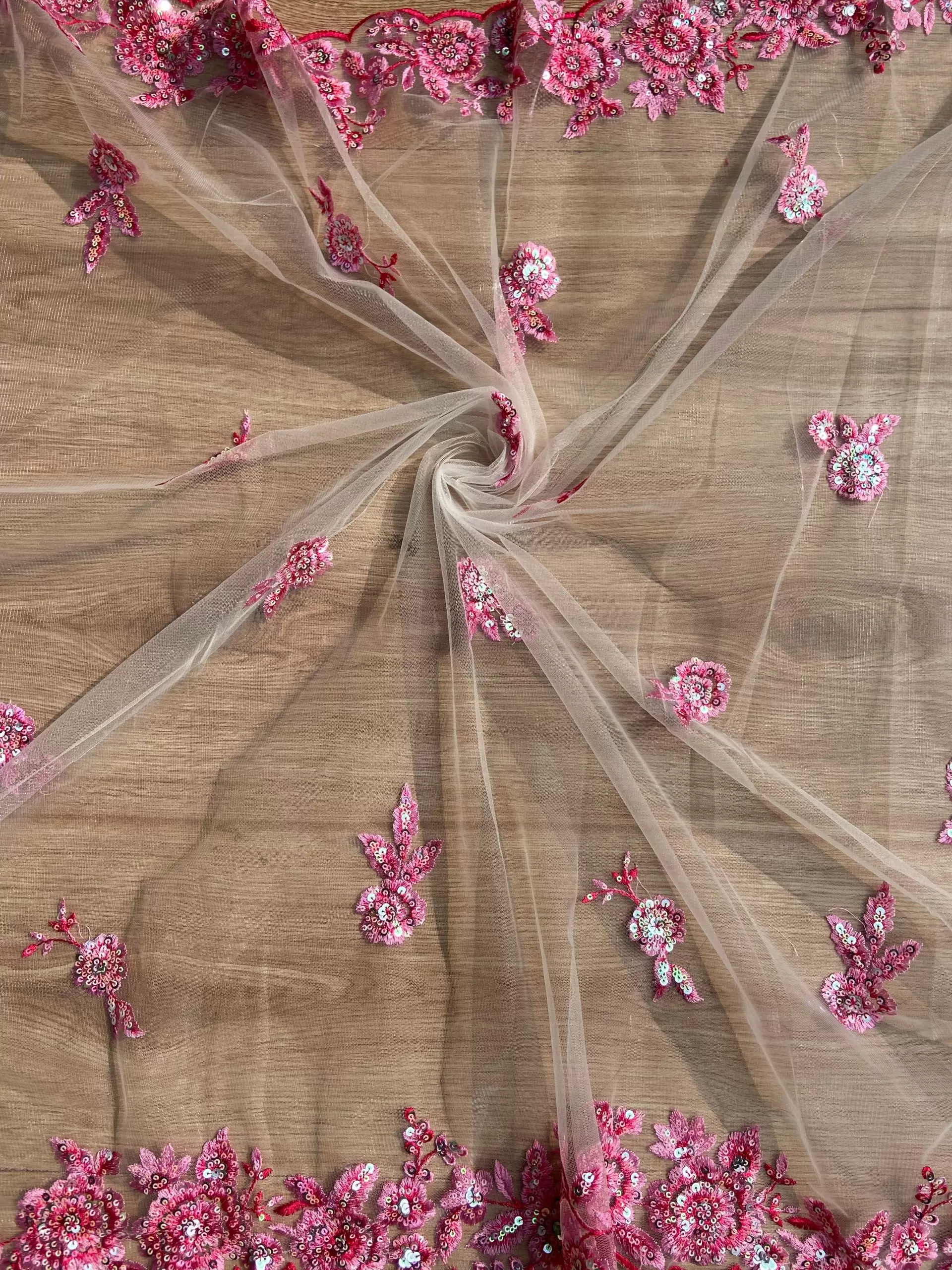 Pink thread and sequin floral embroidery border on net fabric dupatta