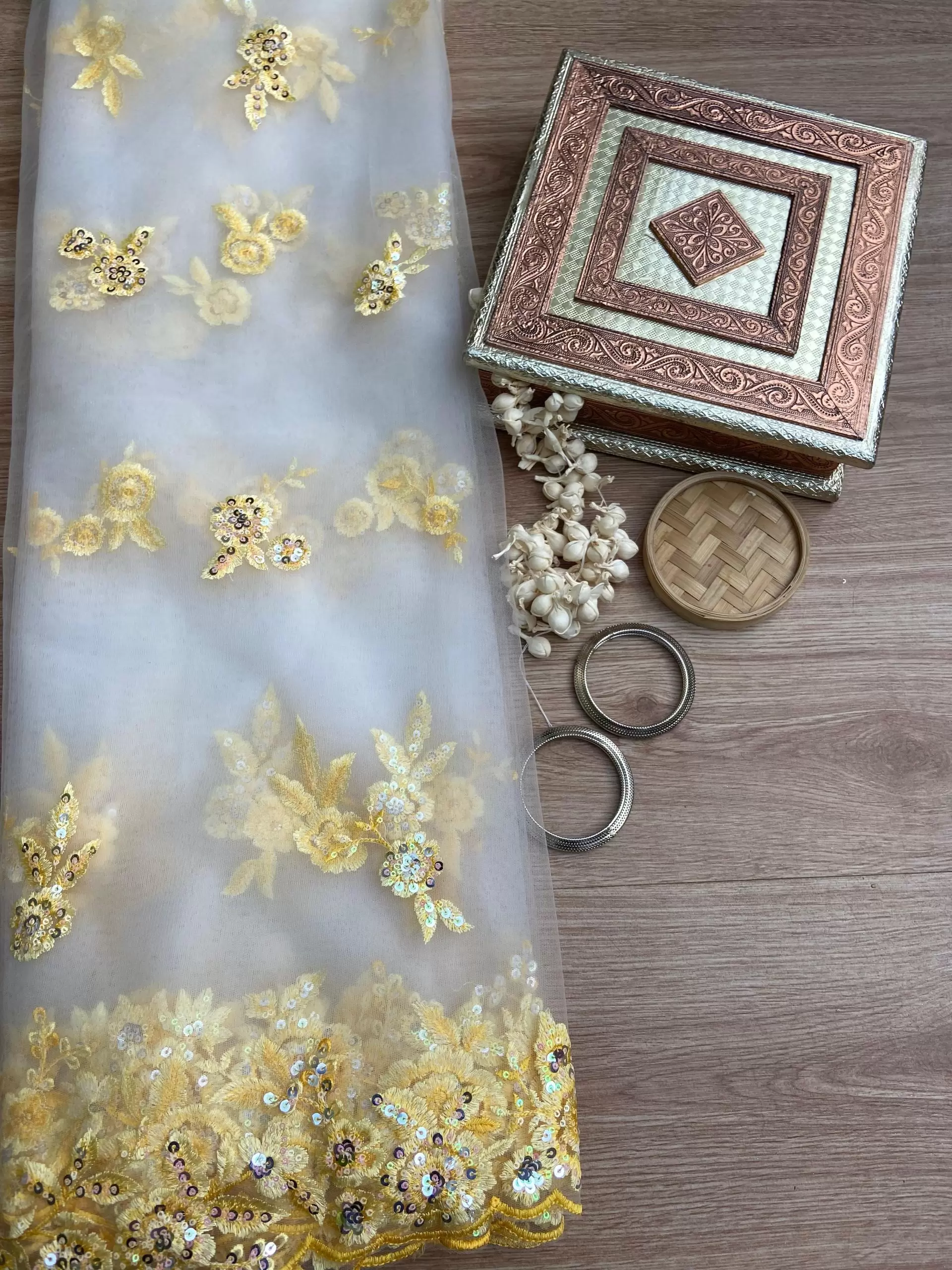 Yellow thread and sequin floral embroidery border on net fabric dupatta