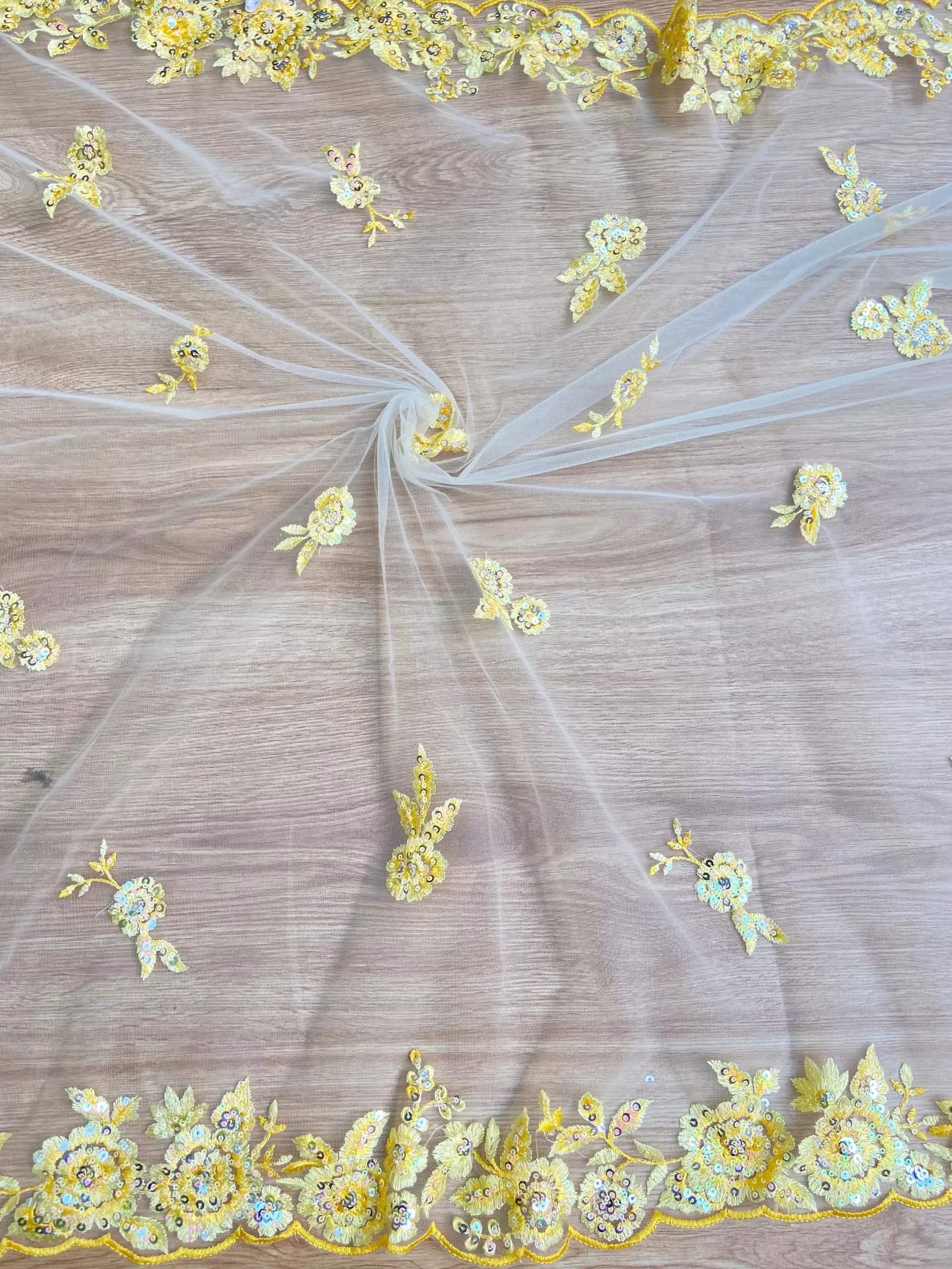 Yellow thread and sequin floral embroidery border on net fabric dupatta