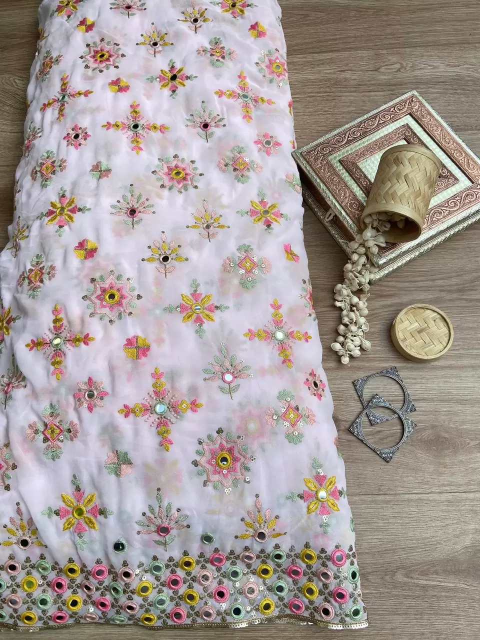 Multicolour thread and mirror embroidery in buta on border baby pink pure georgette fabric