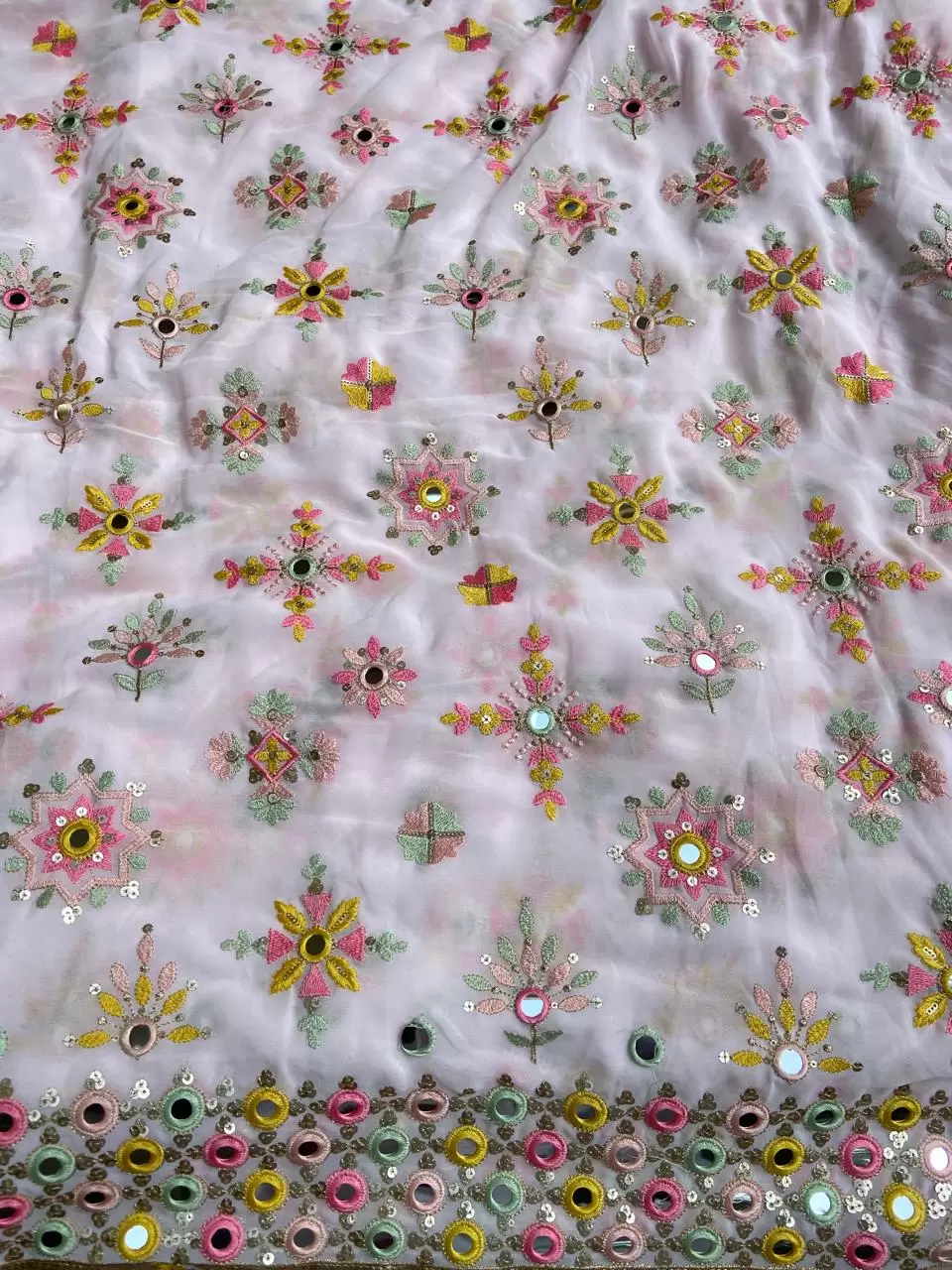 Multicolour thread and mirror embroidery in buta on border baby pink pure georgette fabric