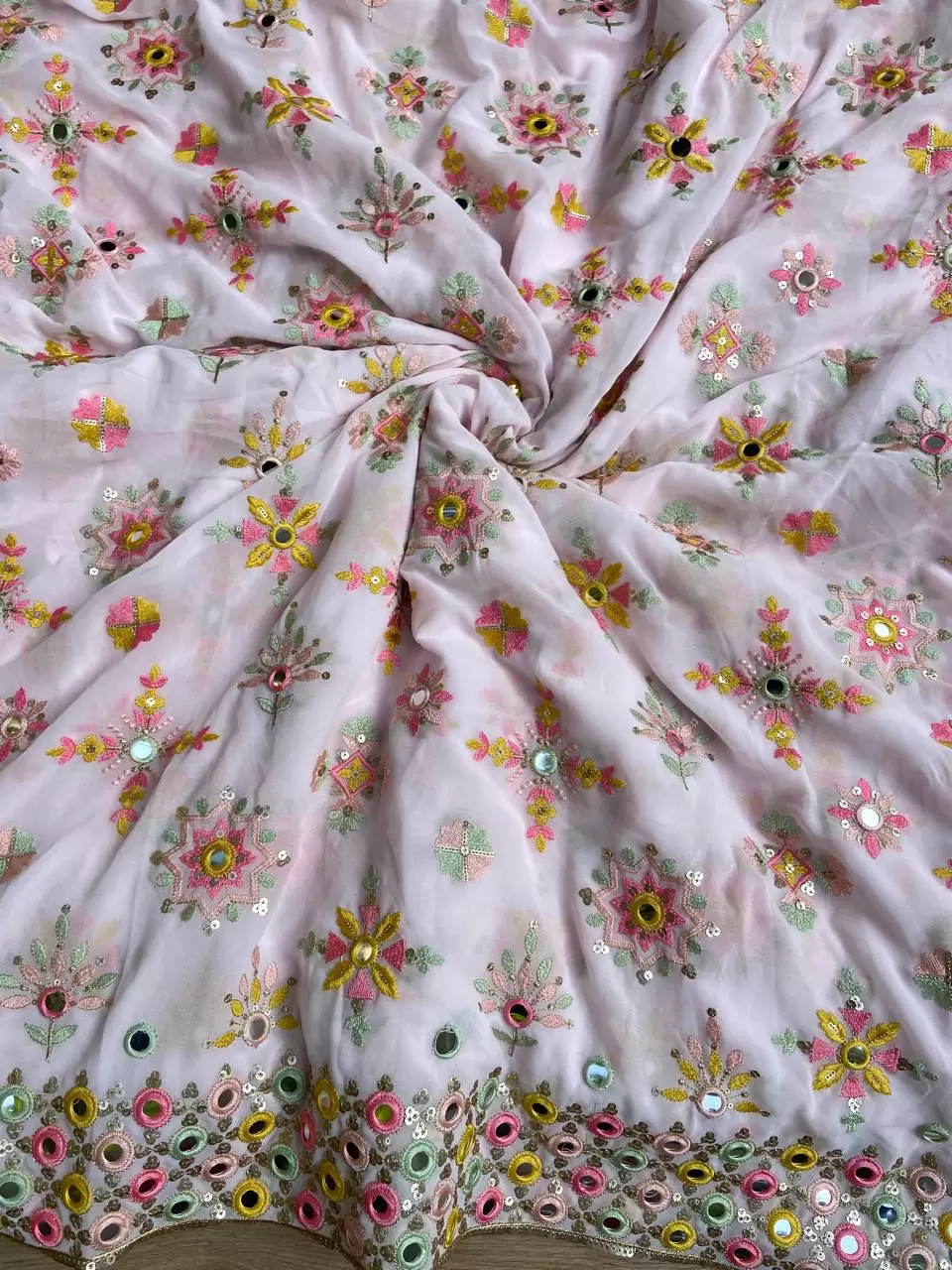 Multicolour thread and mirror embroidery in buta on border baby pink pure georgette fabric