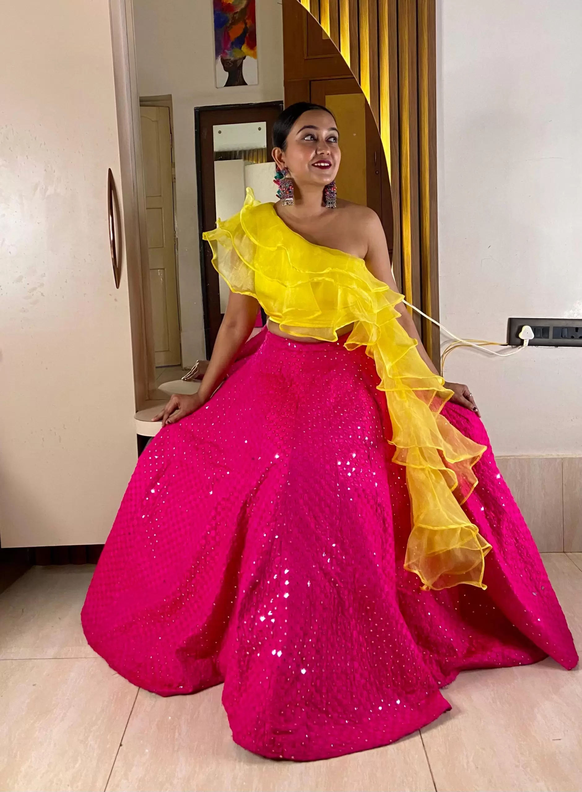 Organza Ruffle Top with a Ruffle Side Trail And Pink Mirror Work Skirt