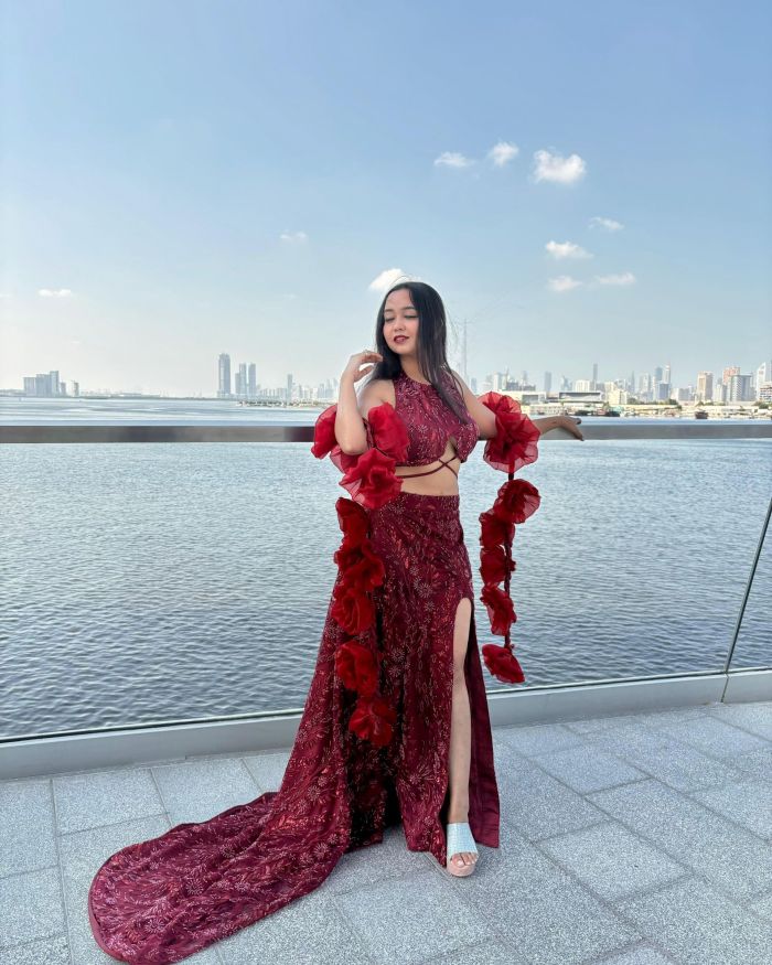 Wine Trail Skirt And a Halter Blouse With Slit Details And a Beautiful Rose Dupatta