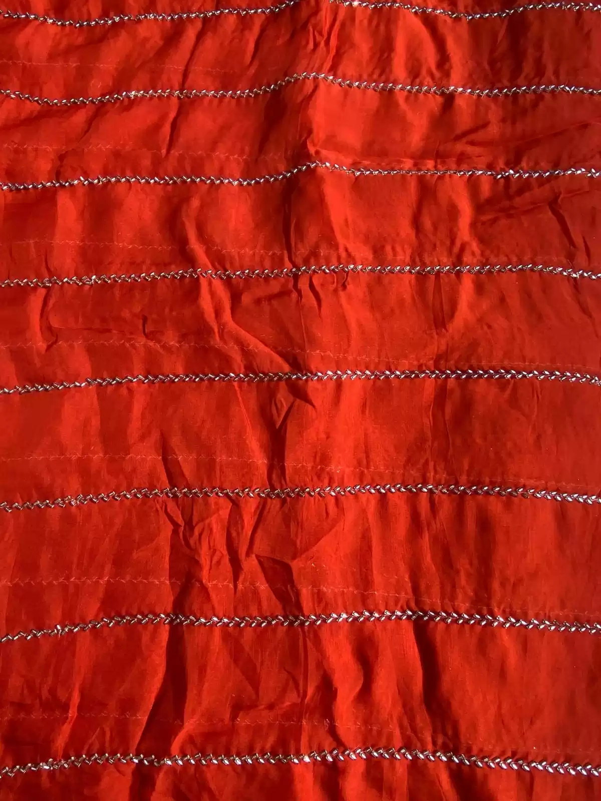 Hand embroidery in stripe Pattern on Rust orange pure organza fabric