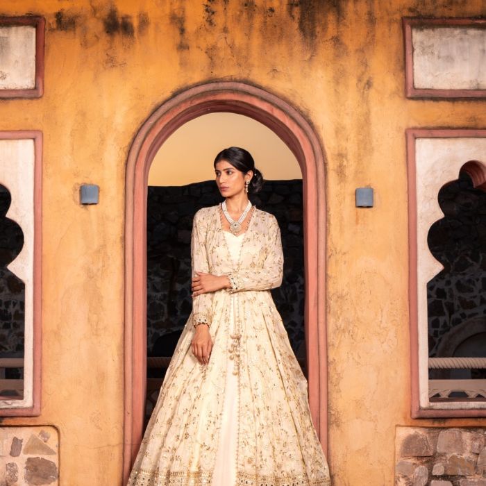 Ivory pure cosmos Tissue silk Lehenga set with full Aanarkal jacket