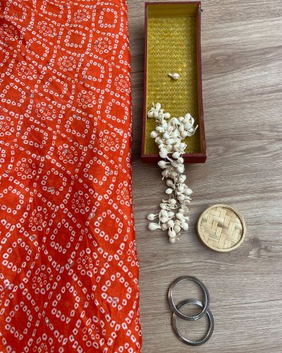 Bandhej Print in  Orange Pure Crepe On Buti Fabric