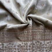 Ivory Pure Cosmos Tissue Silk Fabric with Buti Work and Heavy Zari & Sequin Embroidery Border